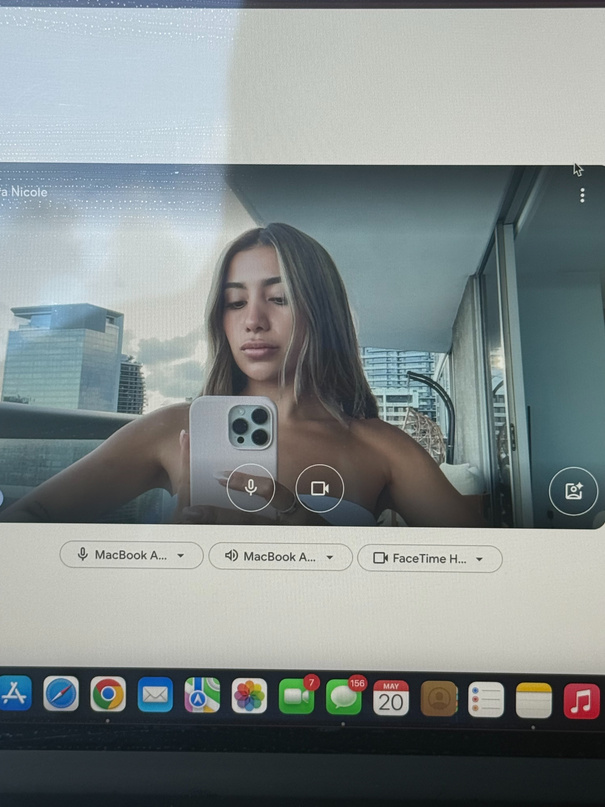Naya on a video call from a high-rise apartment